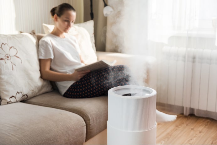 Women using dehumidifier