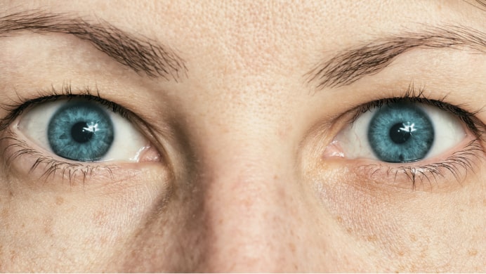 Close up of woman's blue eyes